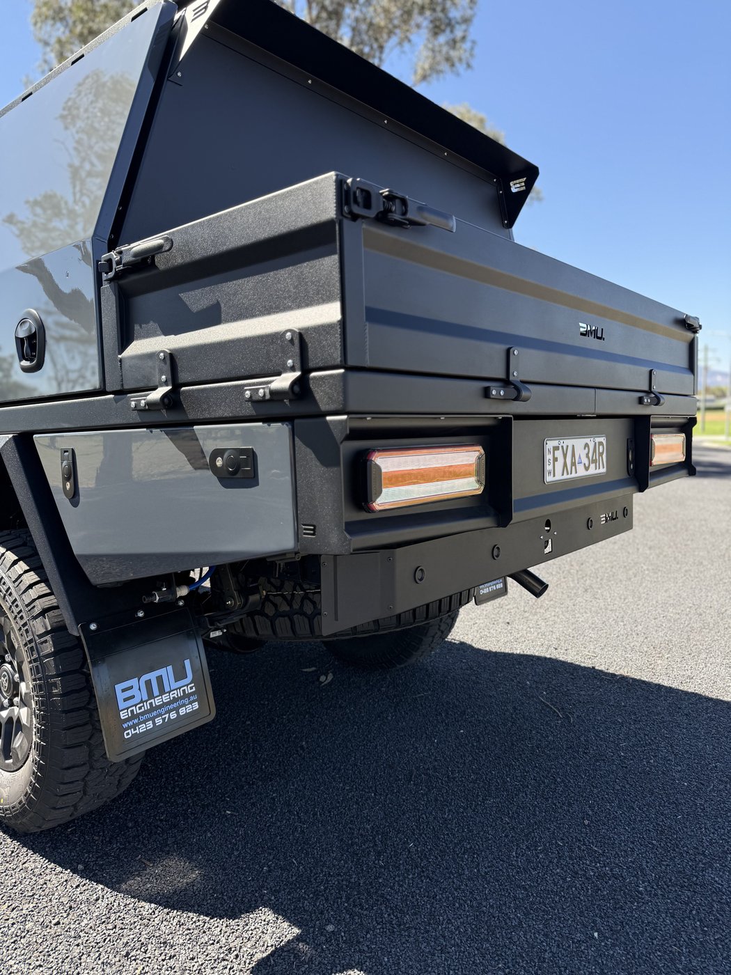 BMU Engineering tray rear with Narva LED taillights, BMU branding and undertray toolboxes